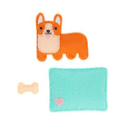 Felt dog-shaped toy with a bone and heart-patterned pouch on a white background