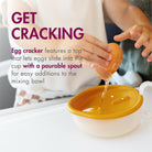 Egg cracker being used to pour liquid into a bowl with text describing its features.