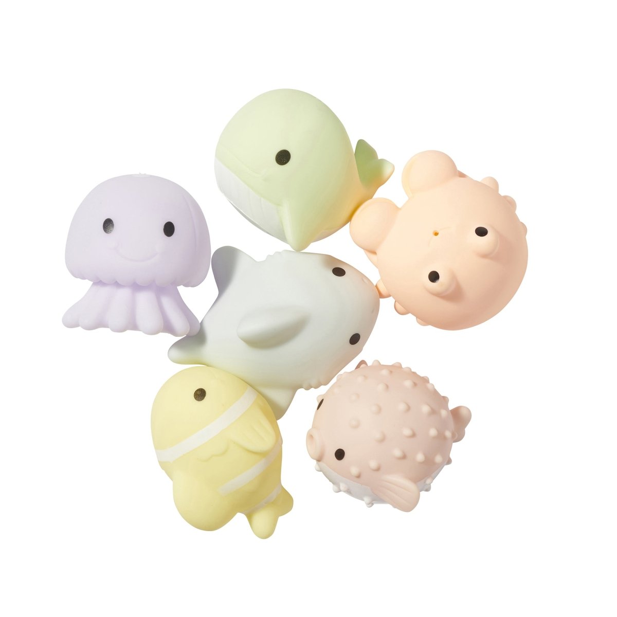 Set of six pastel-colored squishy toys on a white background