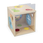 Wooden sensory cube with various textured and colored panels on a white background