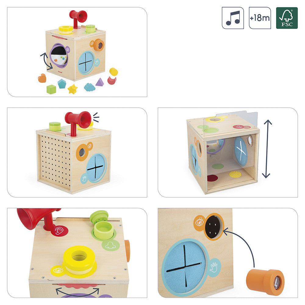 Wooden educational toy cube with various interactive elements and age recommendation.
