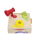 Wooden toy with colorful components on a white background