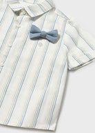 White and blue striped shirt with a gray bow tie on a light gray background