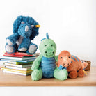 Plush dinosaur toy with a blue shell on a white background