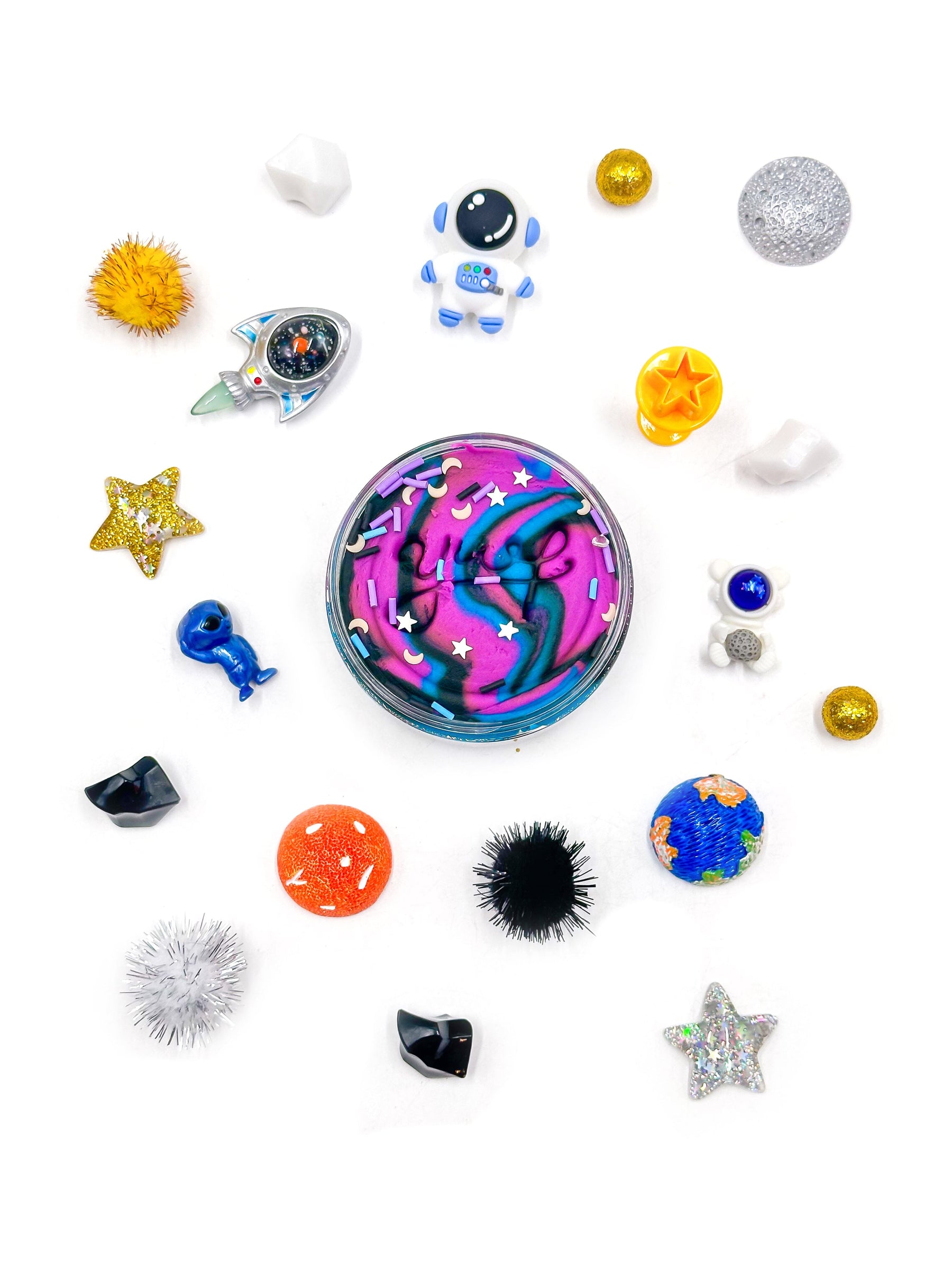 Colorful fidget spinner with various small decorative items on a white background
