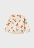 A cream-colored long-sleeve sweatshirt with an all-over print of cartoon foxes in orange-brown and gray, shown flat against a light gray background.