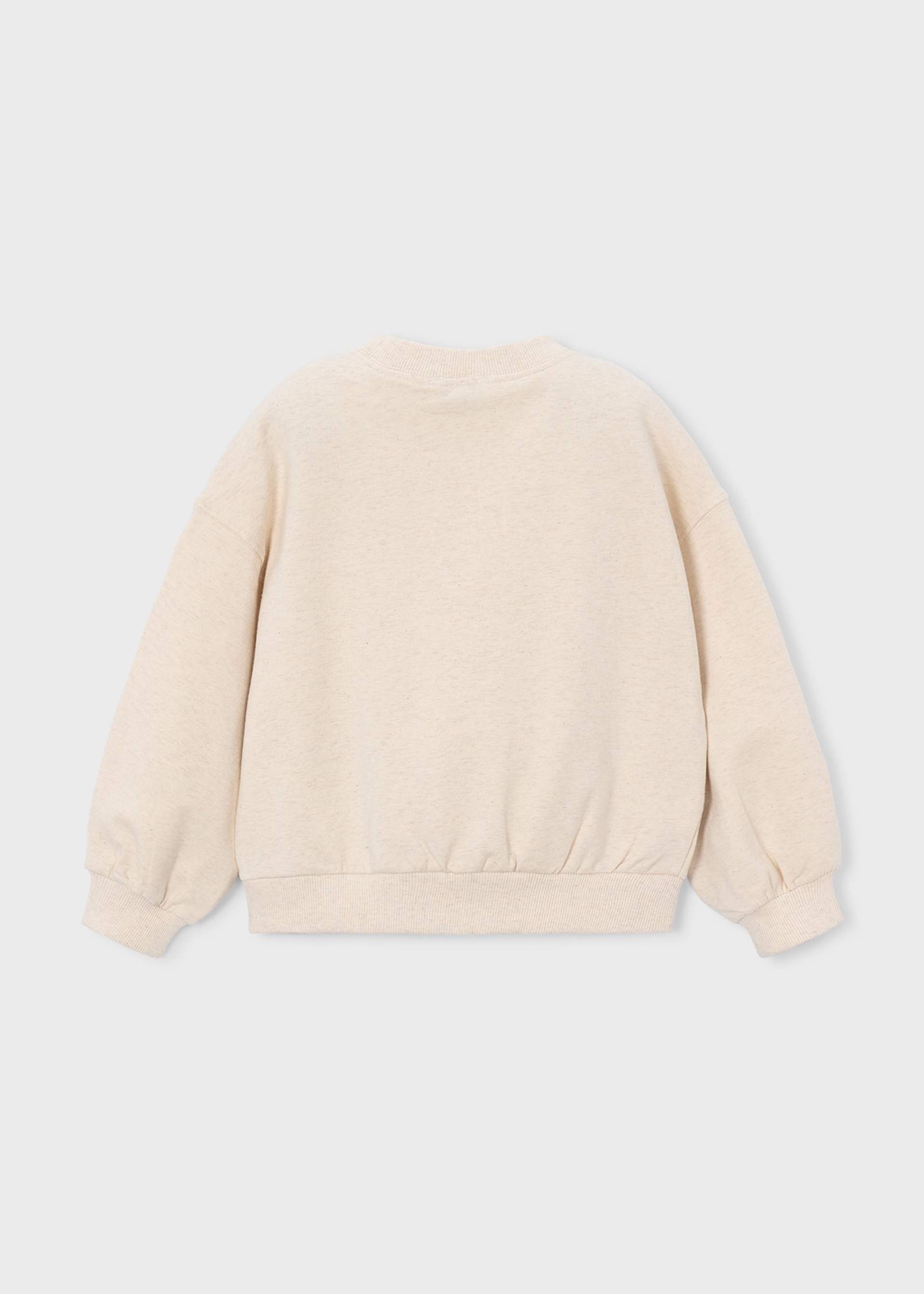 A kids' long-sleeve crewneck sweatshirt / pullover in cream.
