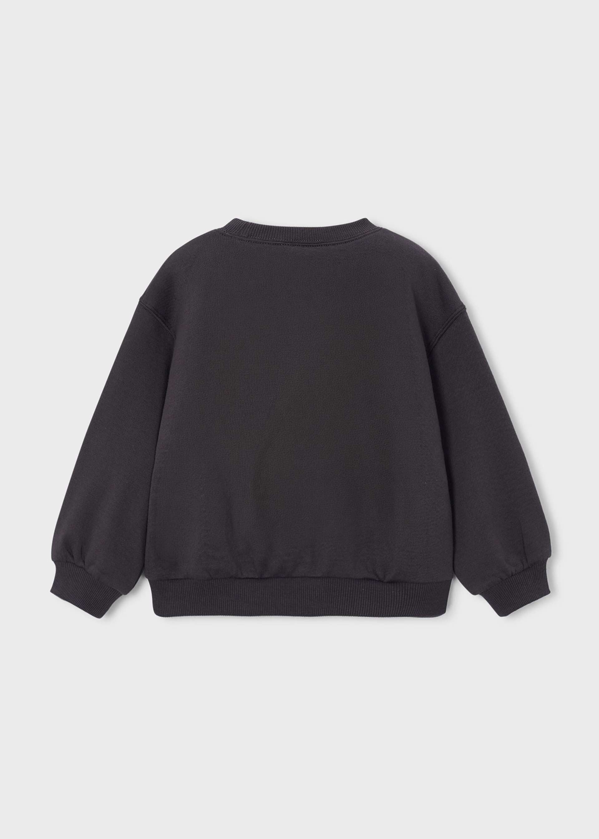 Black sweatshirt on a light gray background