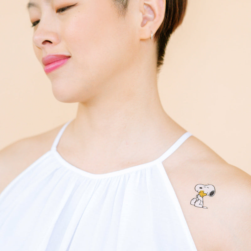 Snoopy Hugs Woodstock Tattoo Pair by Tattly