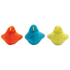 Three colorful duck-shaped toys on a white background