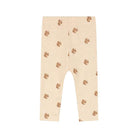 Beige heathered leggings with an all-over brown squirrel print, shown flat against a white background.