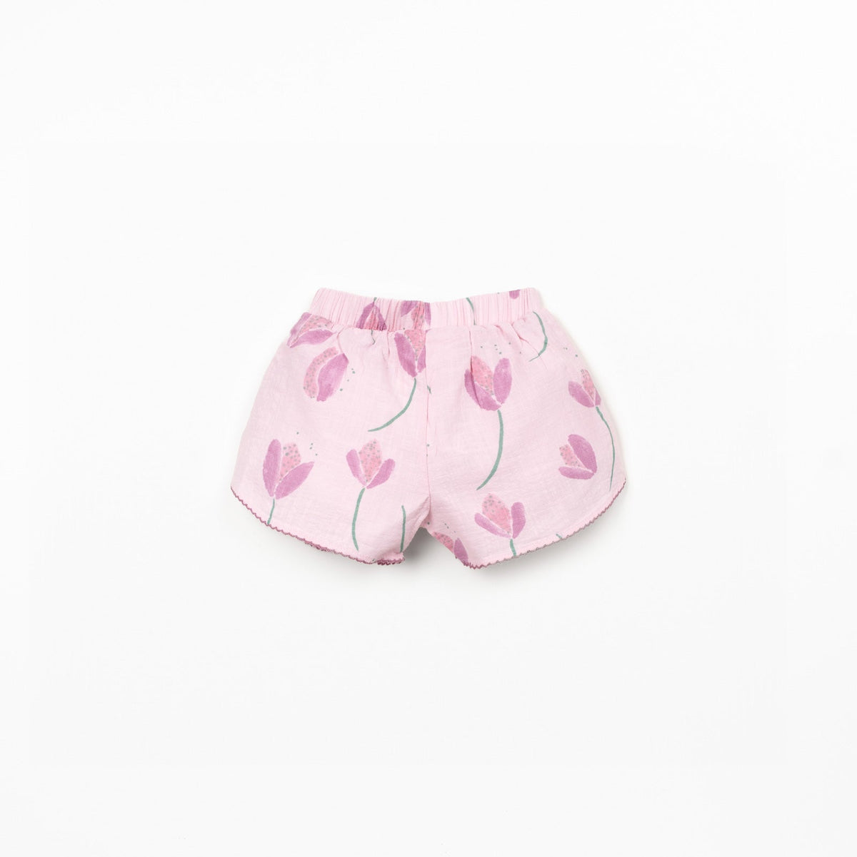 Pink shorts with tulip pattern on a white background
