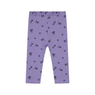 Purple leggings with an all-over berry print, featuring an elastic waistband and leg openings, shown flat against a white background.