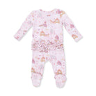A baby long-sleeve footed sleeper in light pink with a whimsical print of castles, hot air balloons, and canoes, featuring a ruffled waistband and textured grip soles.