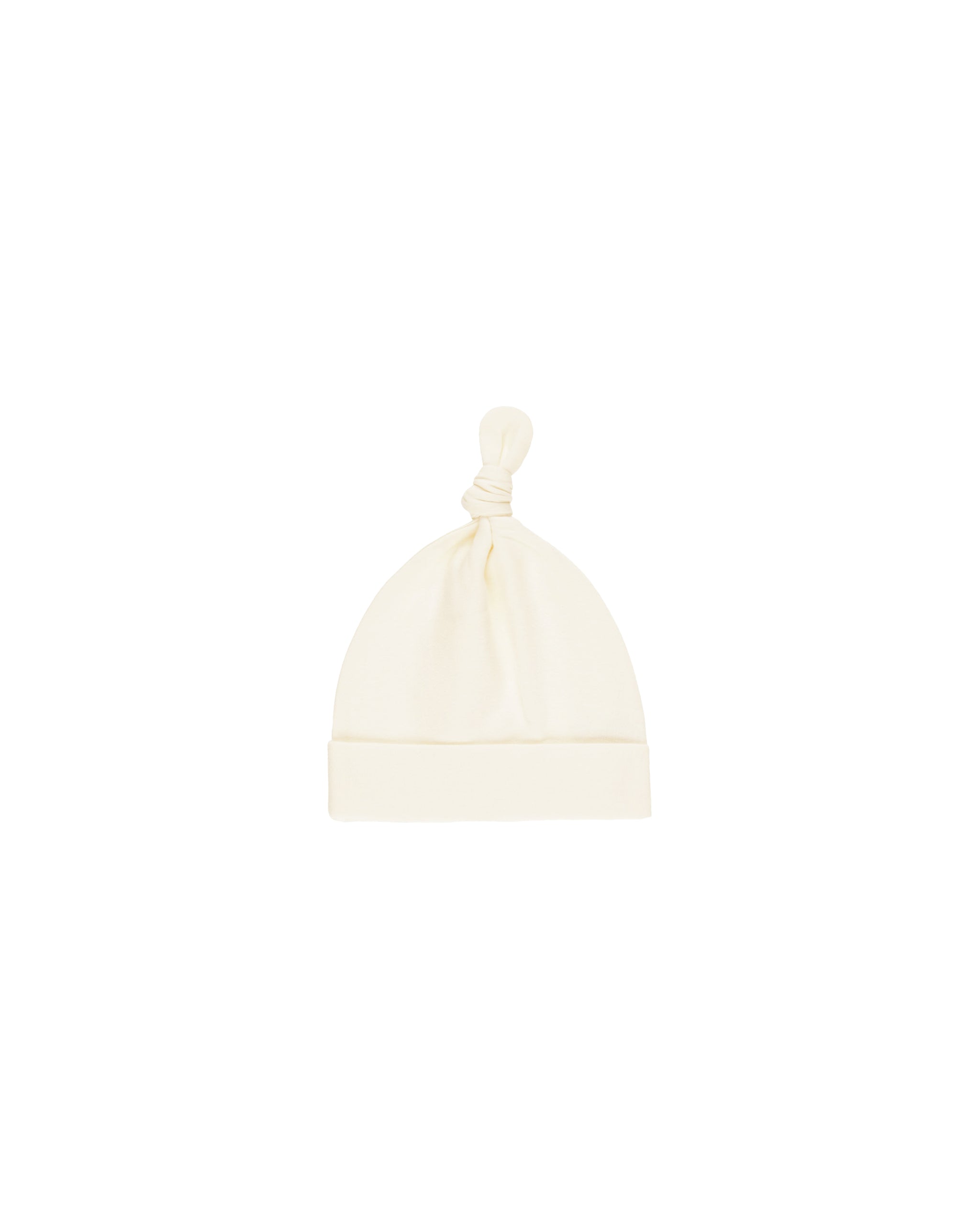 White baby hat on a white background