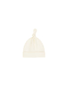 White baby hat on a white background