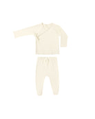 Cream-colored baby onesie on a white background