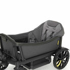 Gray baby car seat with wheels on a white background