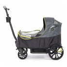 Black and gray stroller with a rain cover on a white background