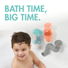 Child in a bathtub with colorful bath toys and text 'Bath Time, Big Time.'