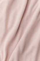 Close-up of pink fabric with folds