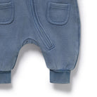 Blue baby pants with pockets on a white background
