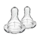 Two clear baby bottle nipples on a white background