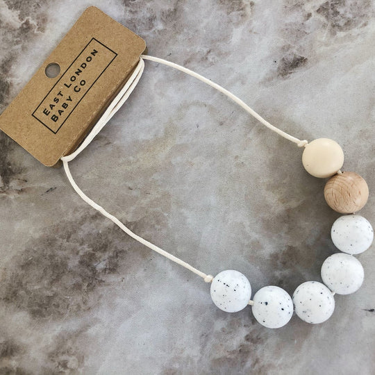 Stokey Silicone Teething Necklace - Cream by East London Baby Co