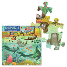 Close up of 4 puzzle pieces and the box of the puzzle